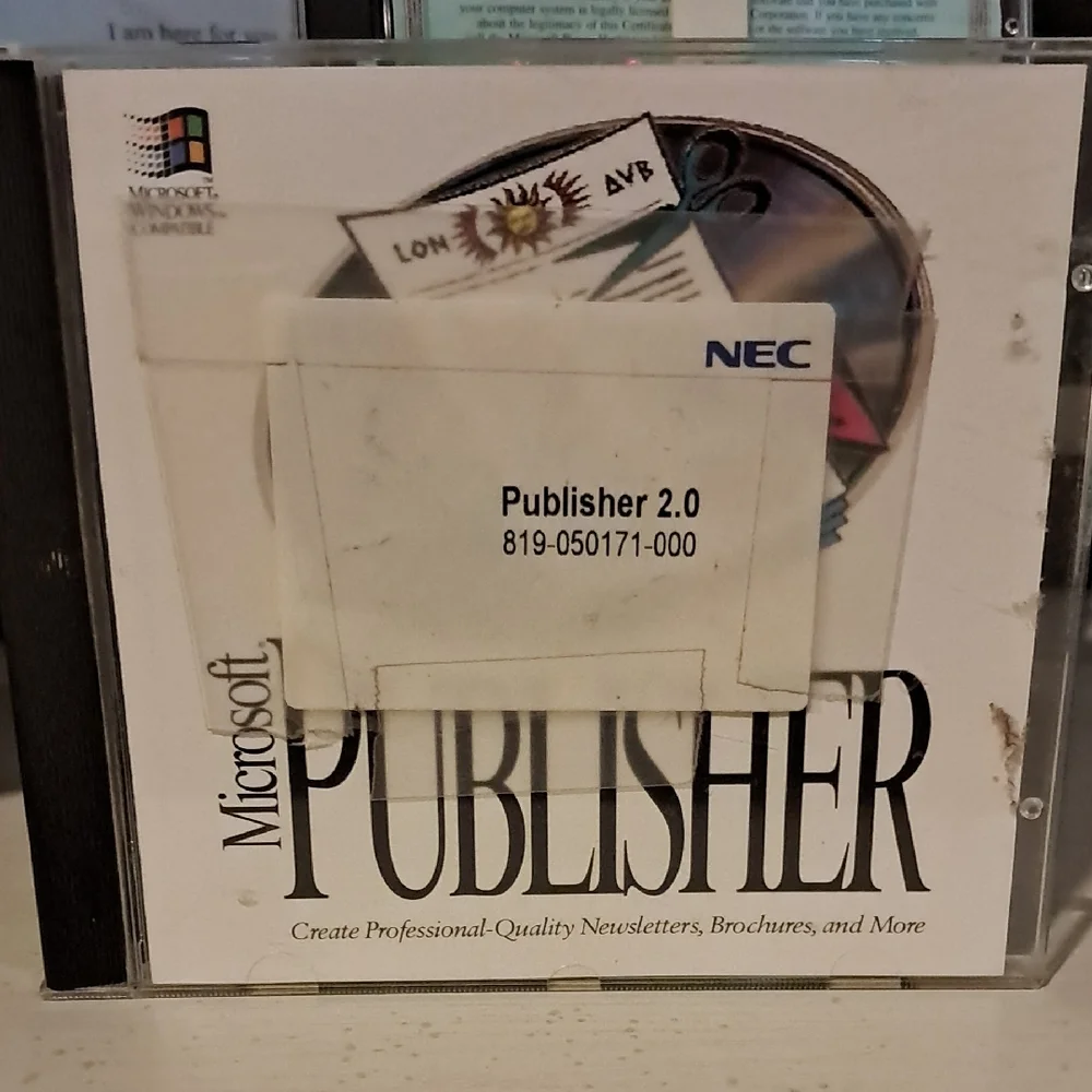 Microsoft Windows 95 and Office CD Set - Silver, Black, and Blue